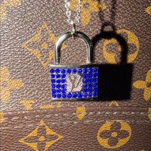 BEAUTIFUL blue Upcycled Louis Vuitton lock charm on 18” 925 silver chain